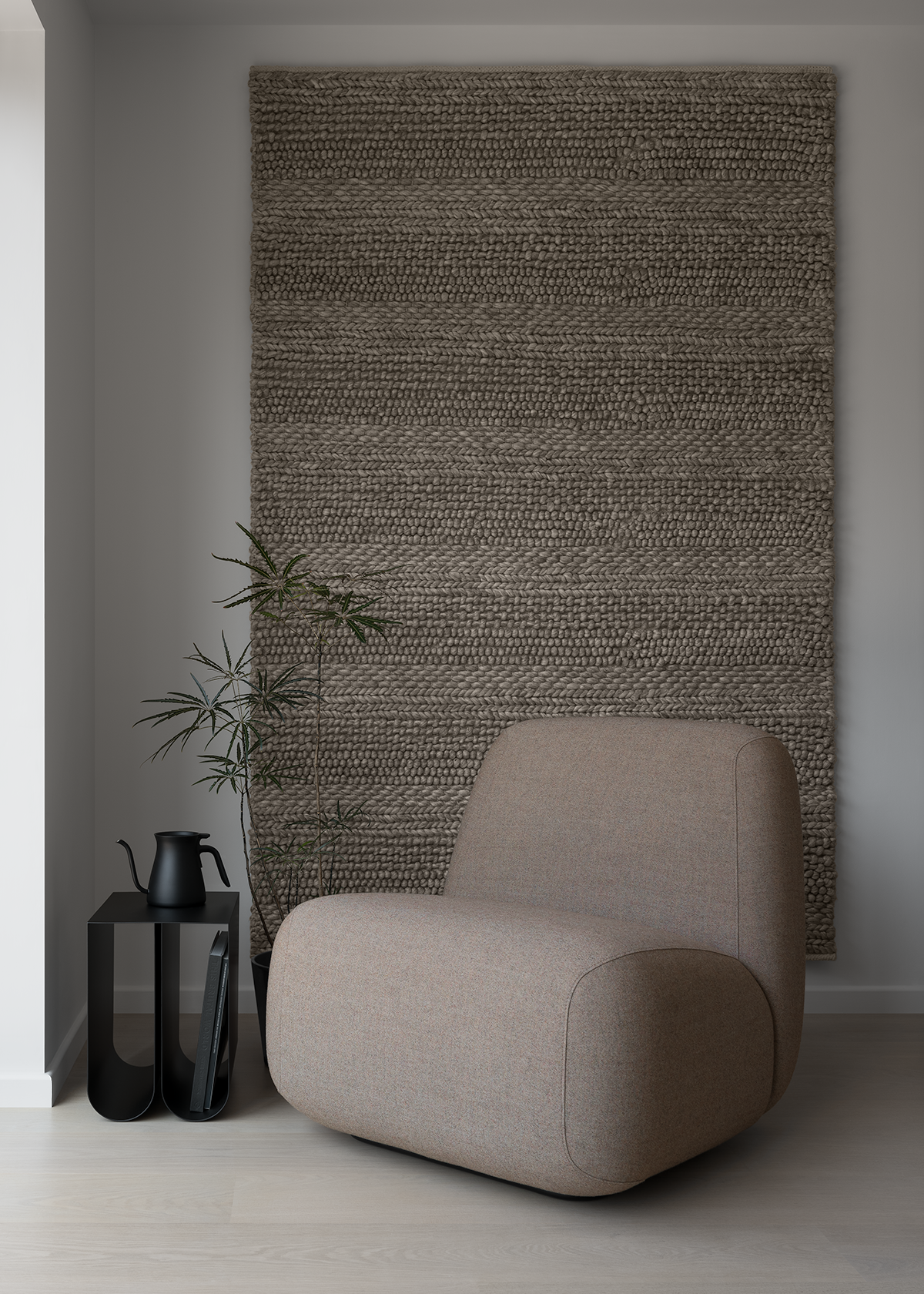 Modern minimal Japanese living room with Scandinavian lounge chair on bleached oak floor with black metal side table, black coffee pot, Plerandra elegantissima plant against a grey brown wall rug