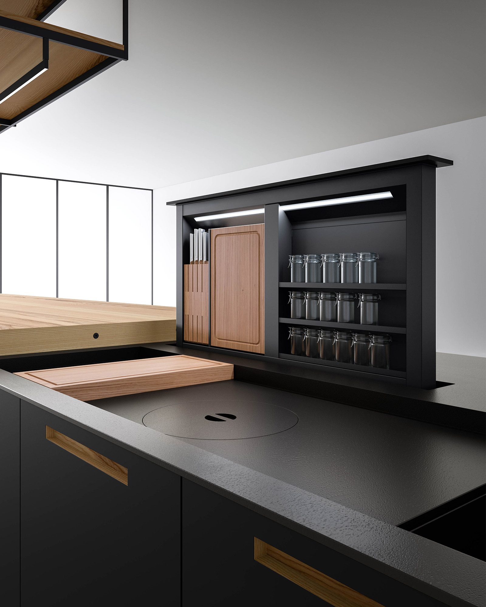 knife block, chopping slab and storage containers rise out of minimal kitchen worktop