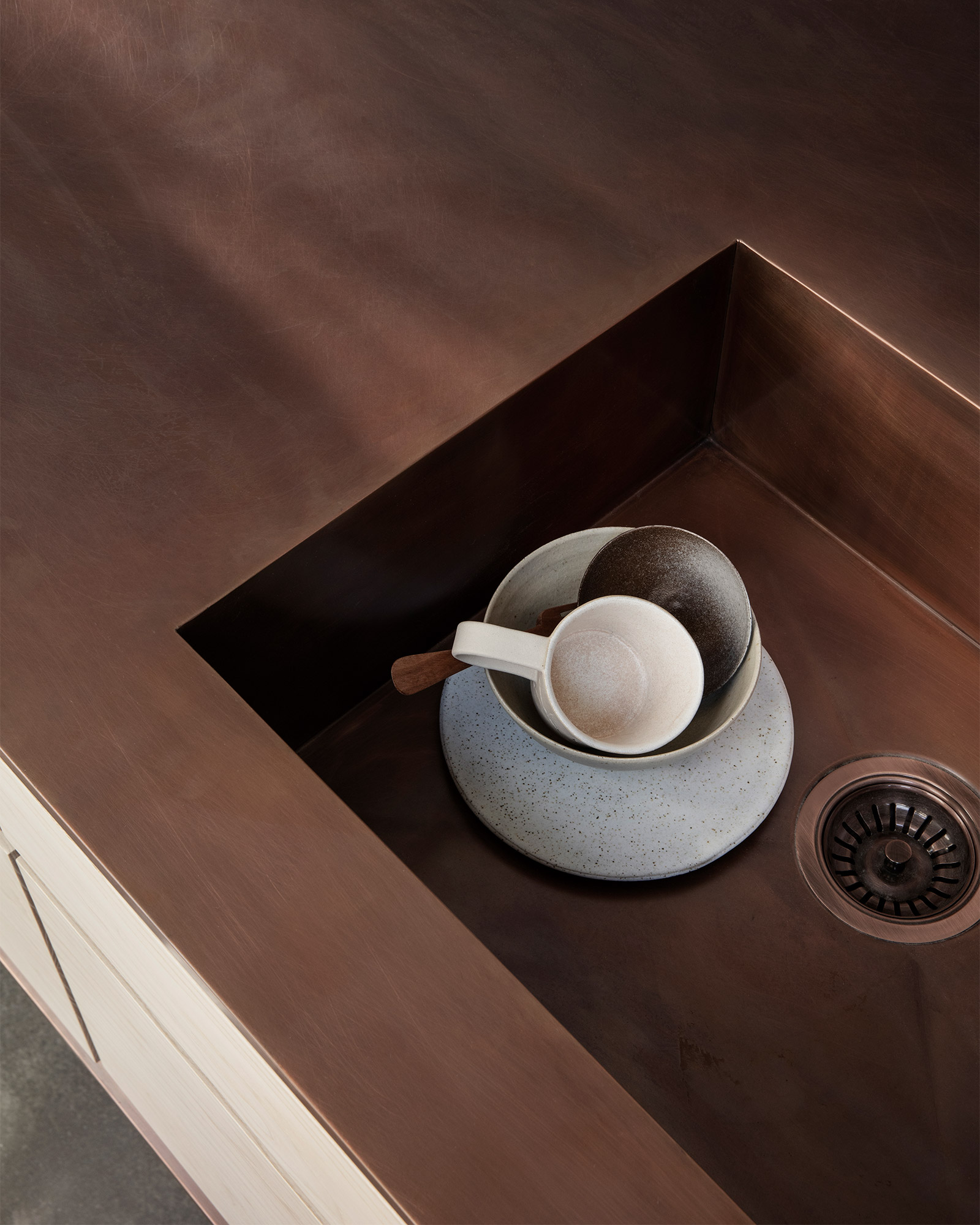 Kitchen worktop and sink made from continuous sheet of copper metal