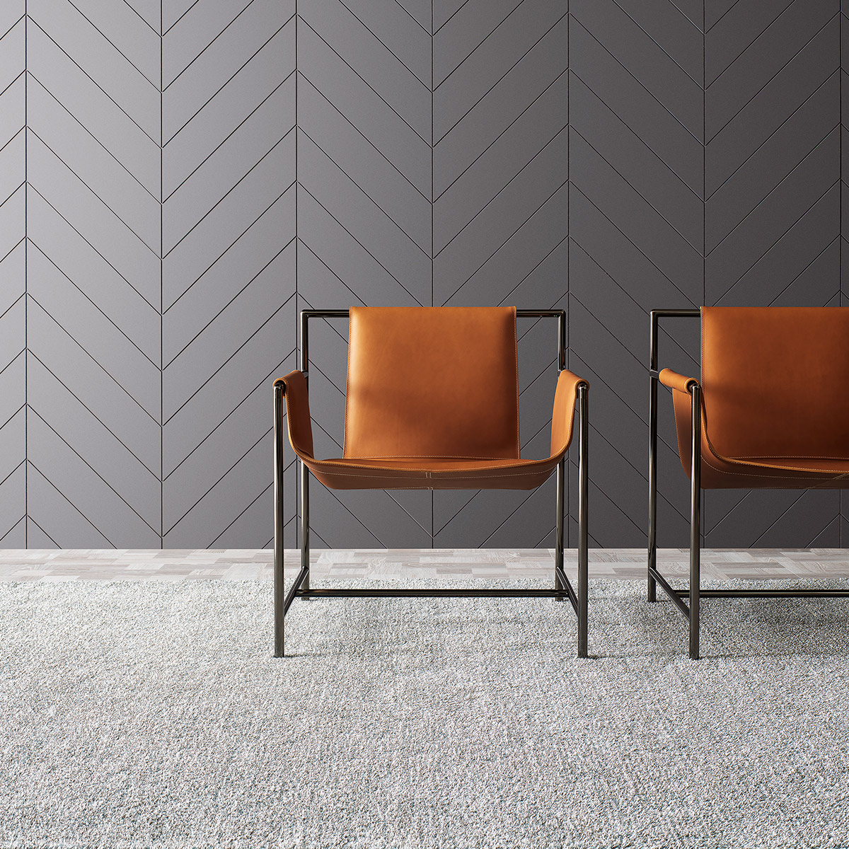 grey rug and tan leather modern armchair