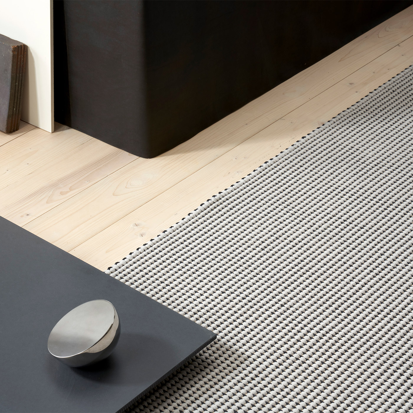 black and white cotton and paper yarn rug