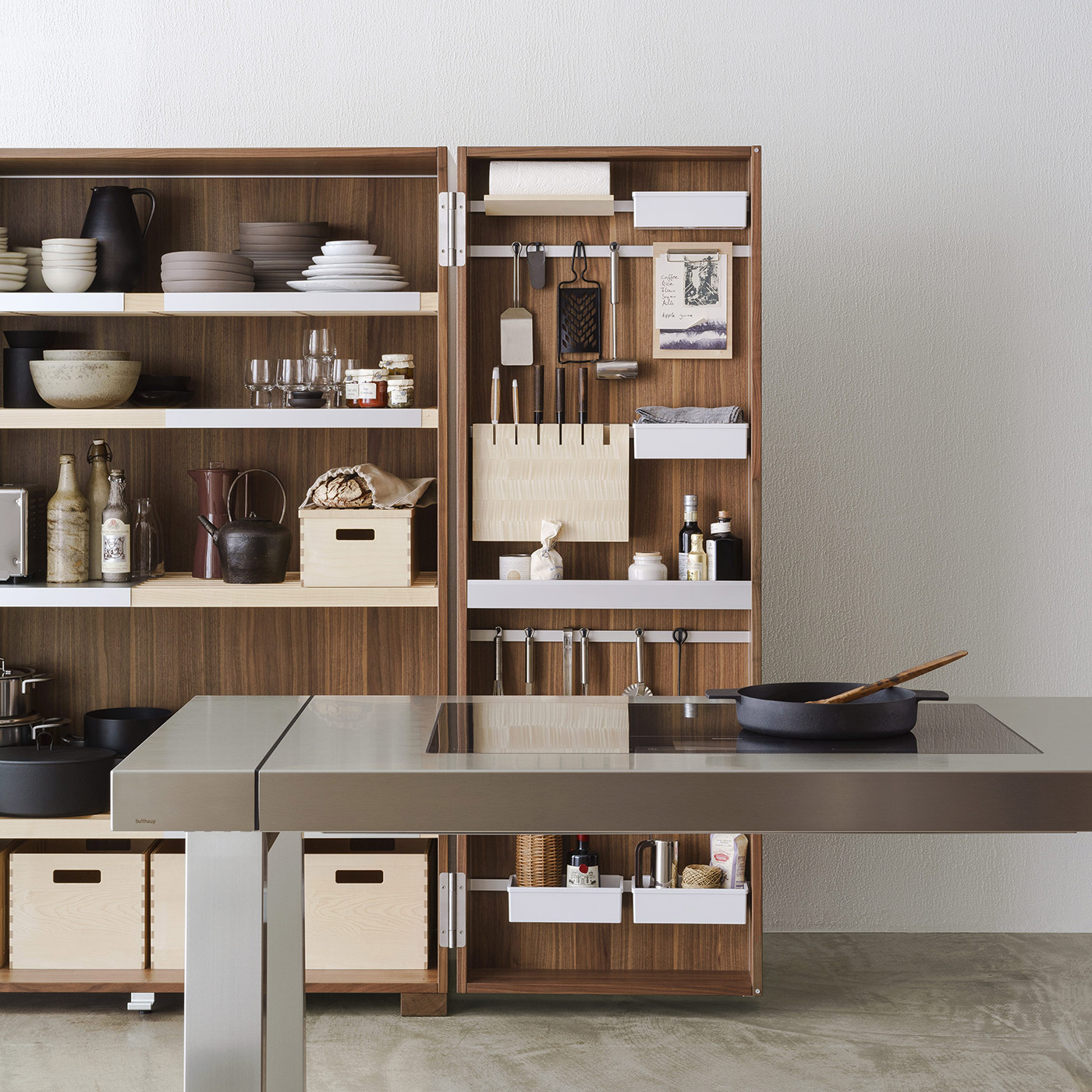 open b2 kitchen tool cabinet with pots, pans, utensils, knives, tableware, glassware and food storage