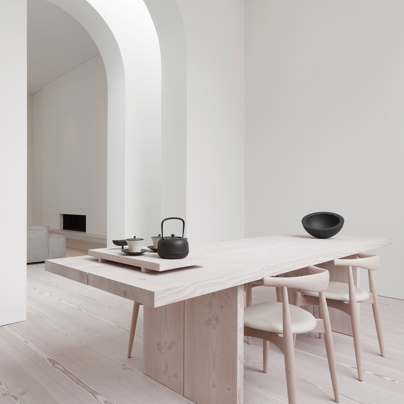 minimal wooden dining table in a calm white Japanese interior with wooden Douglas floor