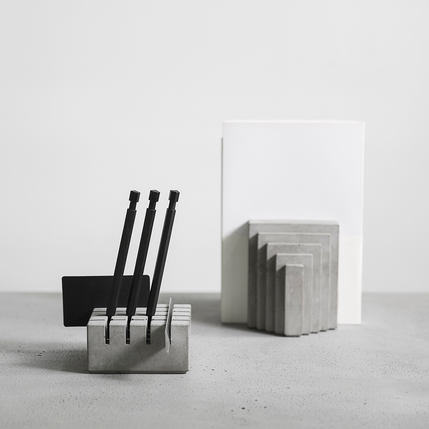 brutalist concrete pen holder and bookend