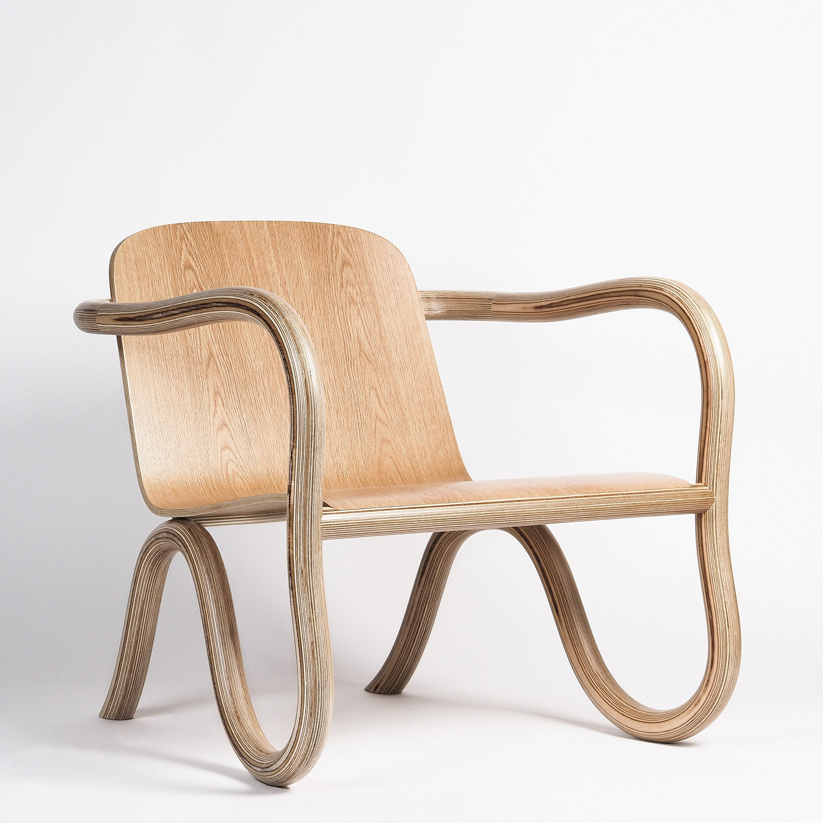 Moulded oak plywood lounge chair
