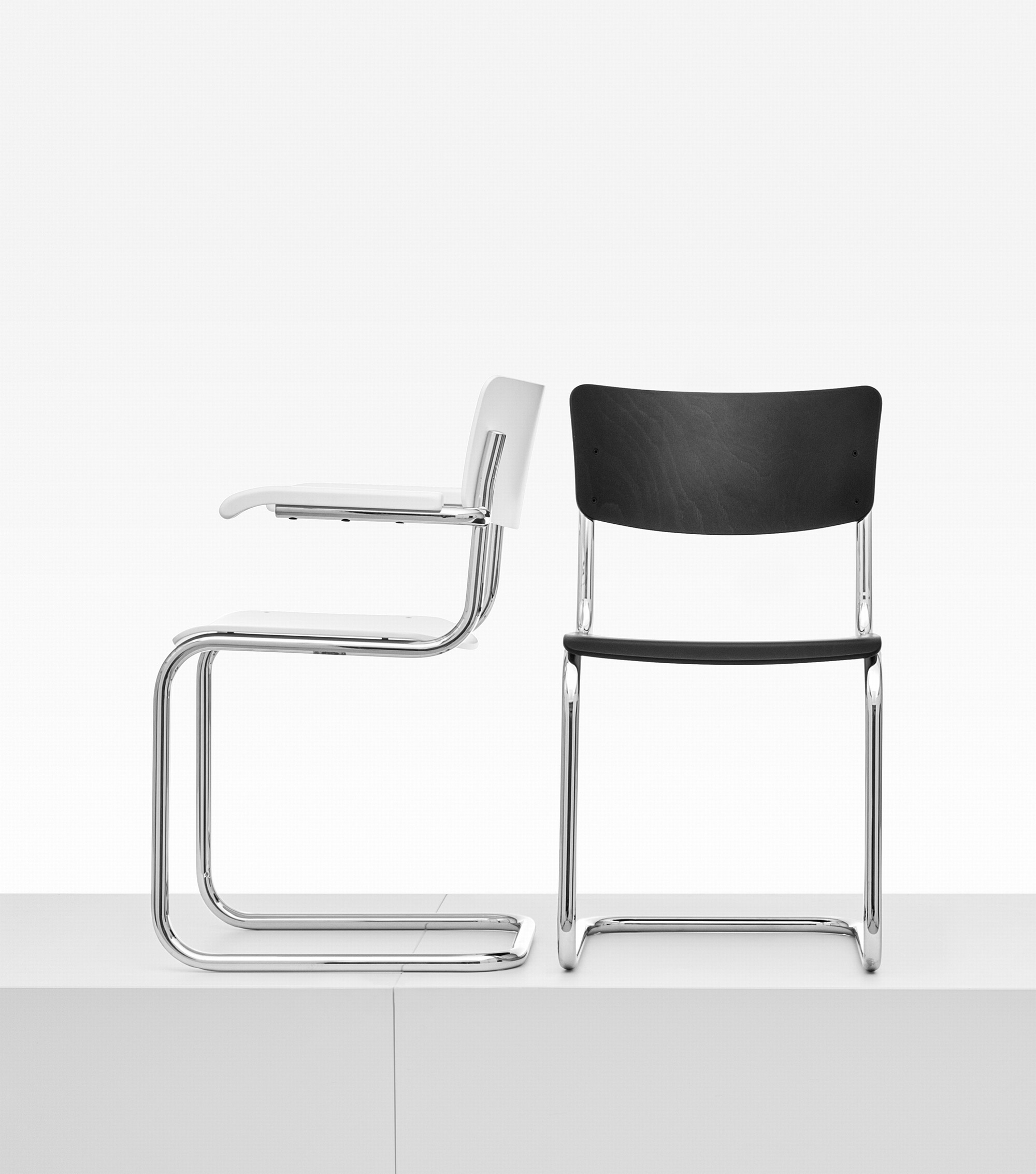 Iconic Bauhaus S 43 cantilever chair in chrome steel, black or white plywood seats