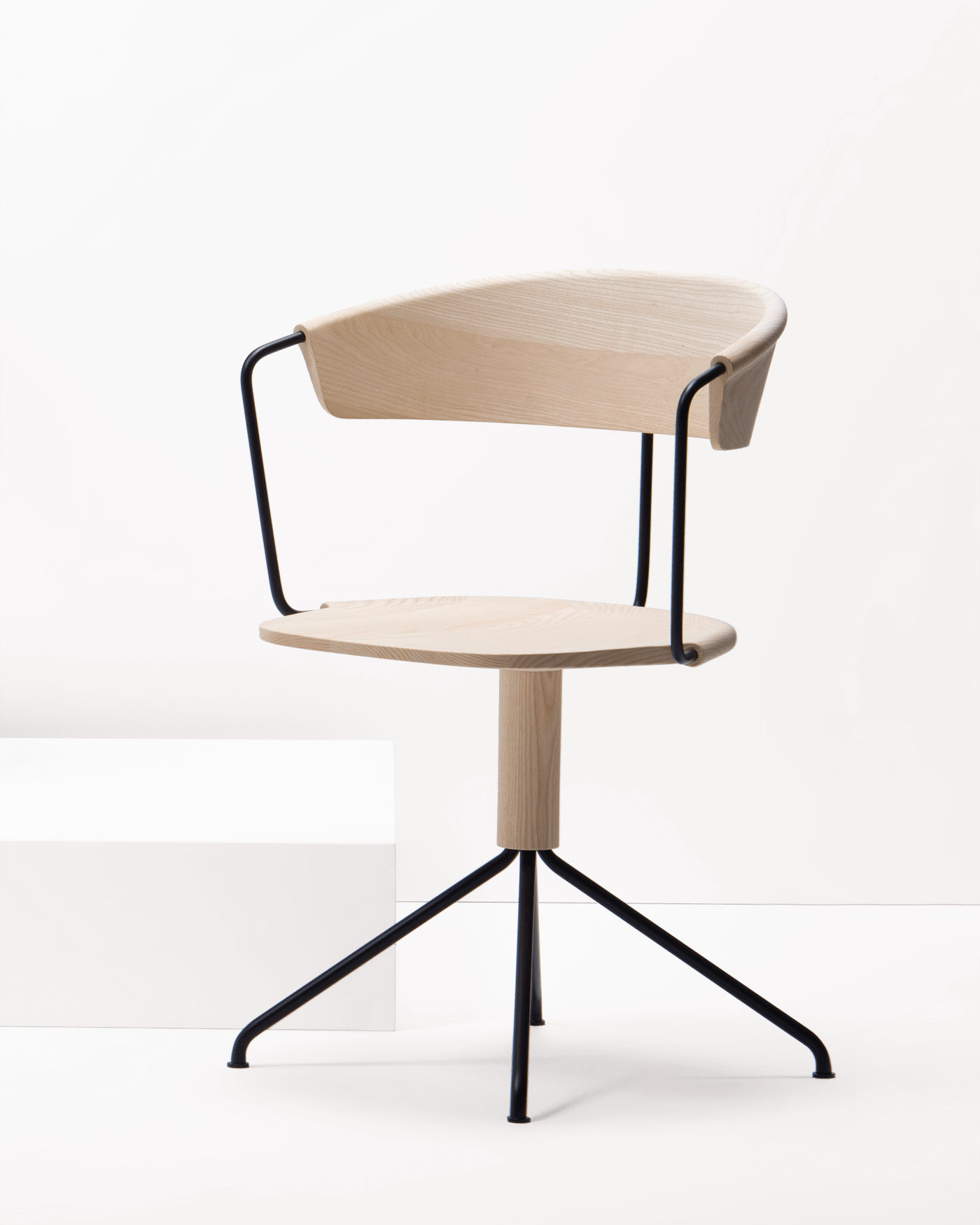 modern swivel chair in ash wood and black tubular steel