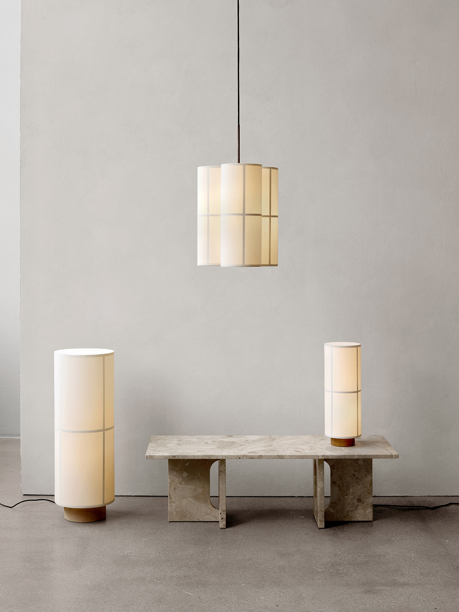 Hashira lighting collection, marble table, grey wall