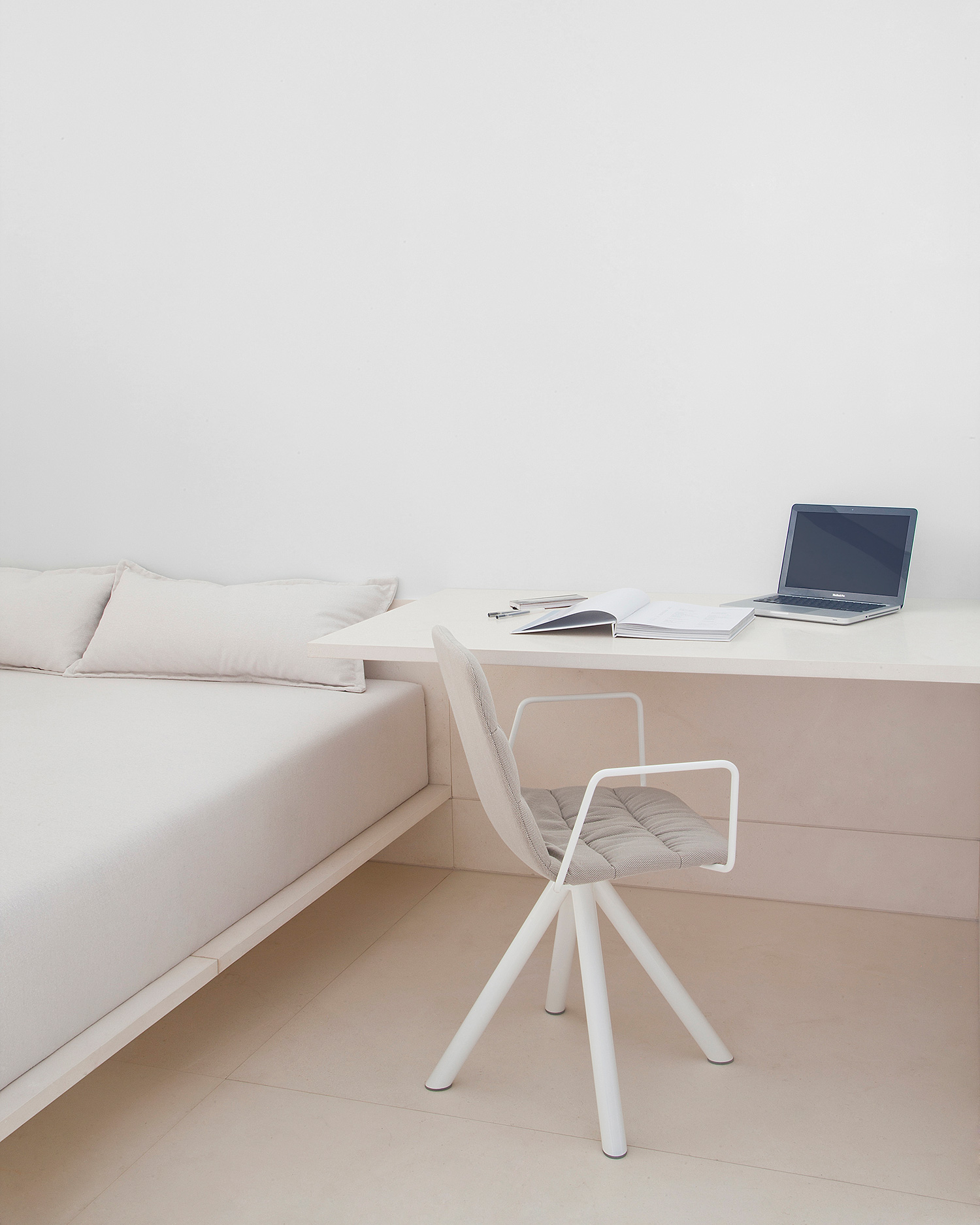 Maarten swivel base chair in white by Viccarbe