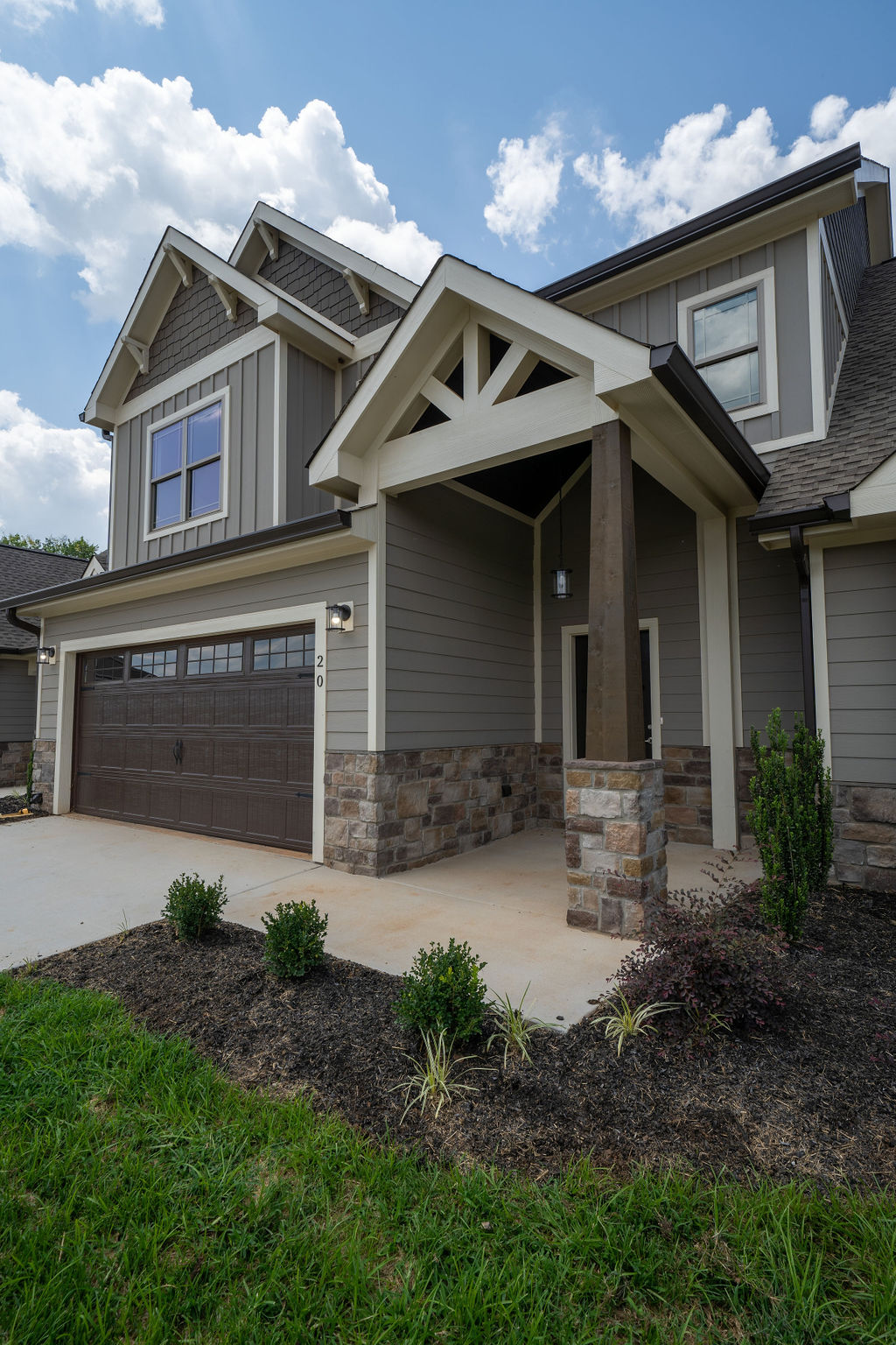 Exterior of lake villa with garage