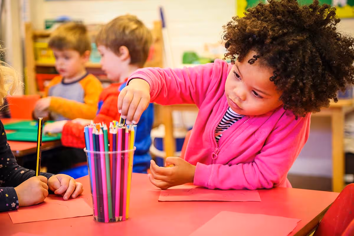 photo of a child drawing