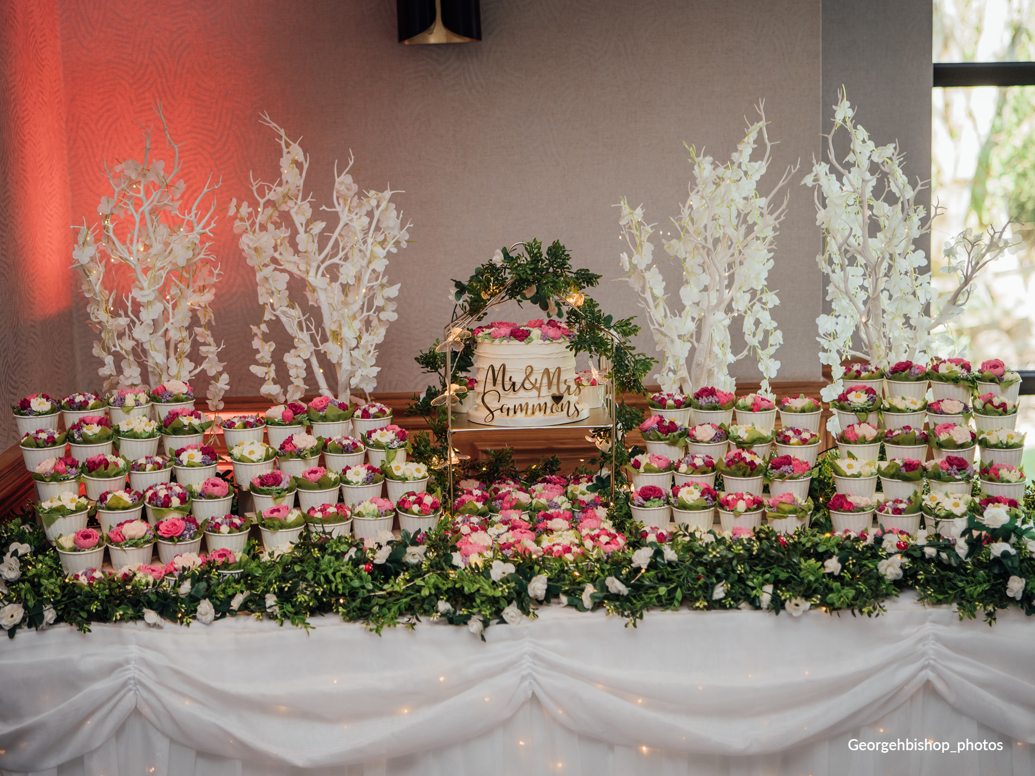 Colourful wedding cupcake garden in pinks