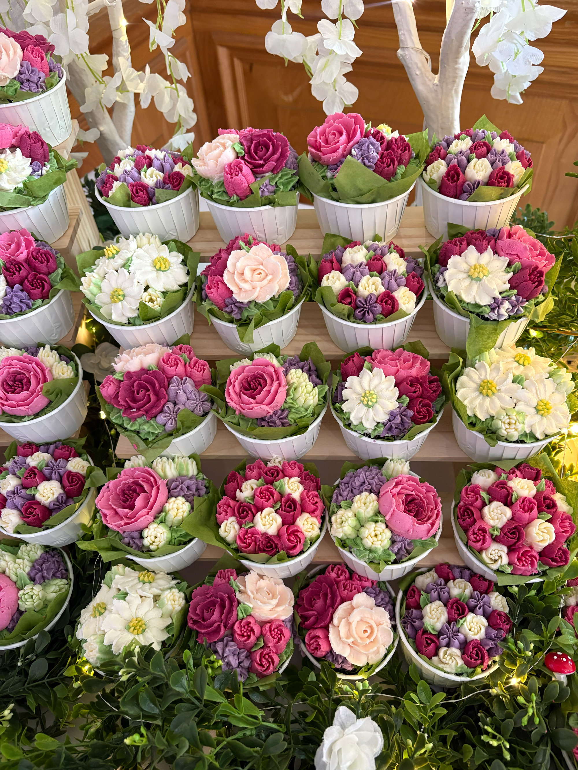 Colourful wedding cupcake garden selection