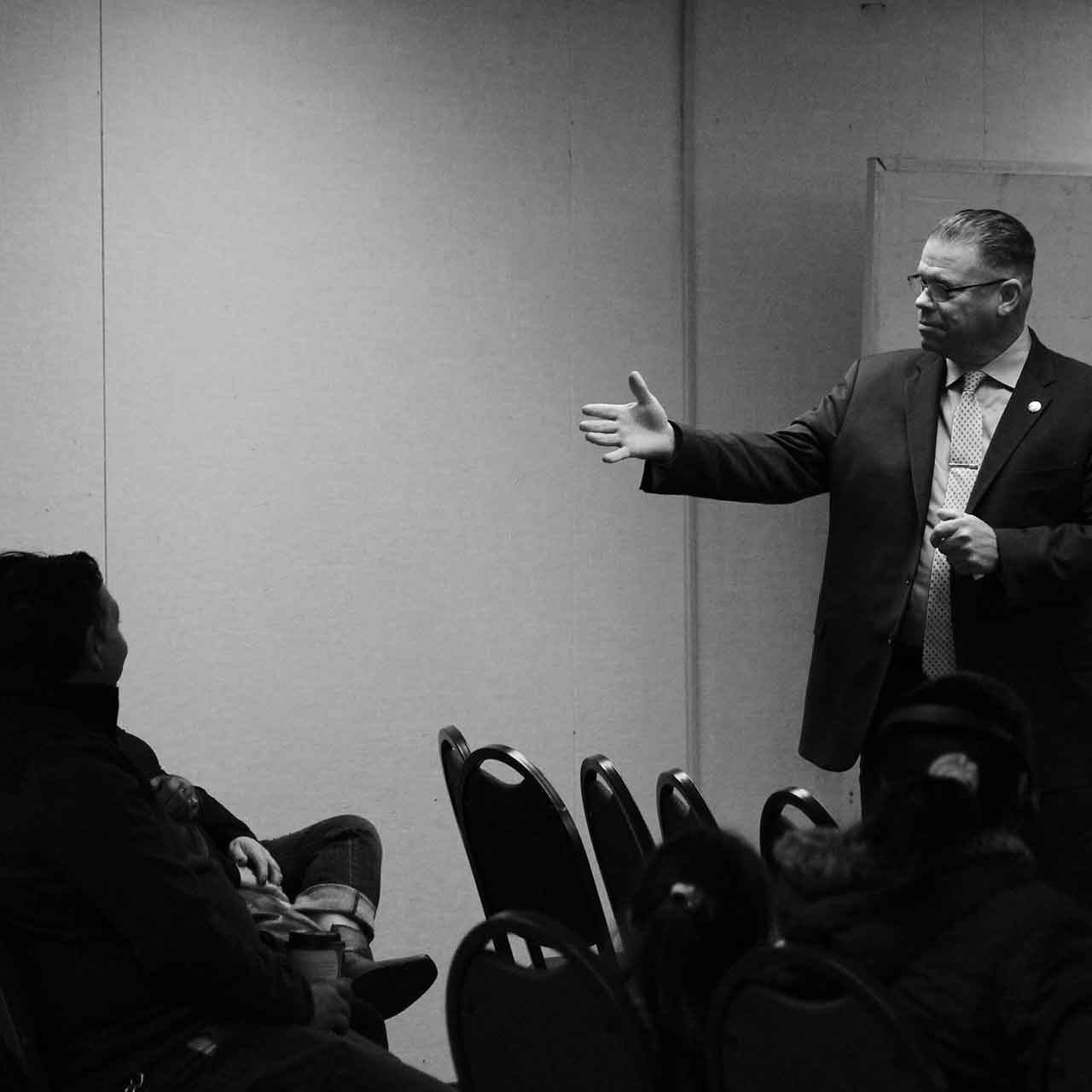 Photo of Mark Cripe speaking to an audience.