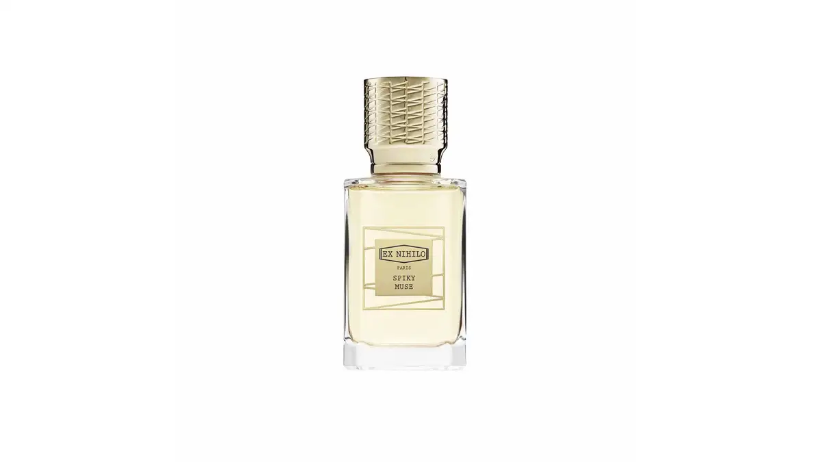 Flacone di vetro del profumo Spiky Muse di EX NIHILO Paris, con un elegante tappo dorato lavorato, esempio di profumeria di lusso