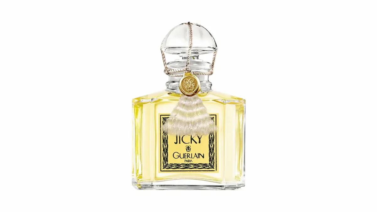 Bottiglia iconica del profumo Guerlain Jicky, un'opera d'arte della profumeria classica di lusso con un tappo decorato e nappa