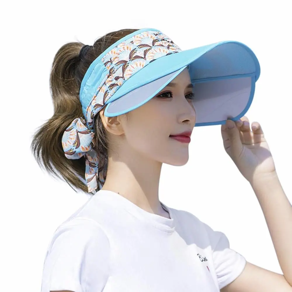 Visiera parasole donna blu a tesa larga con pannello esteso e fiocco regolabile, protezione UV UPF 50+ per mare e sport