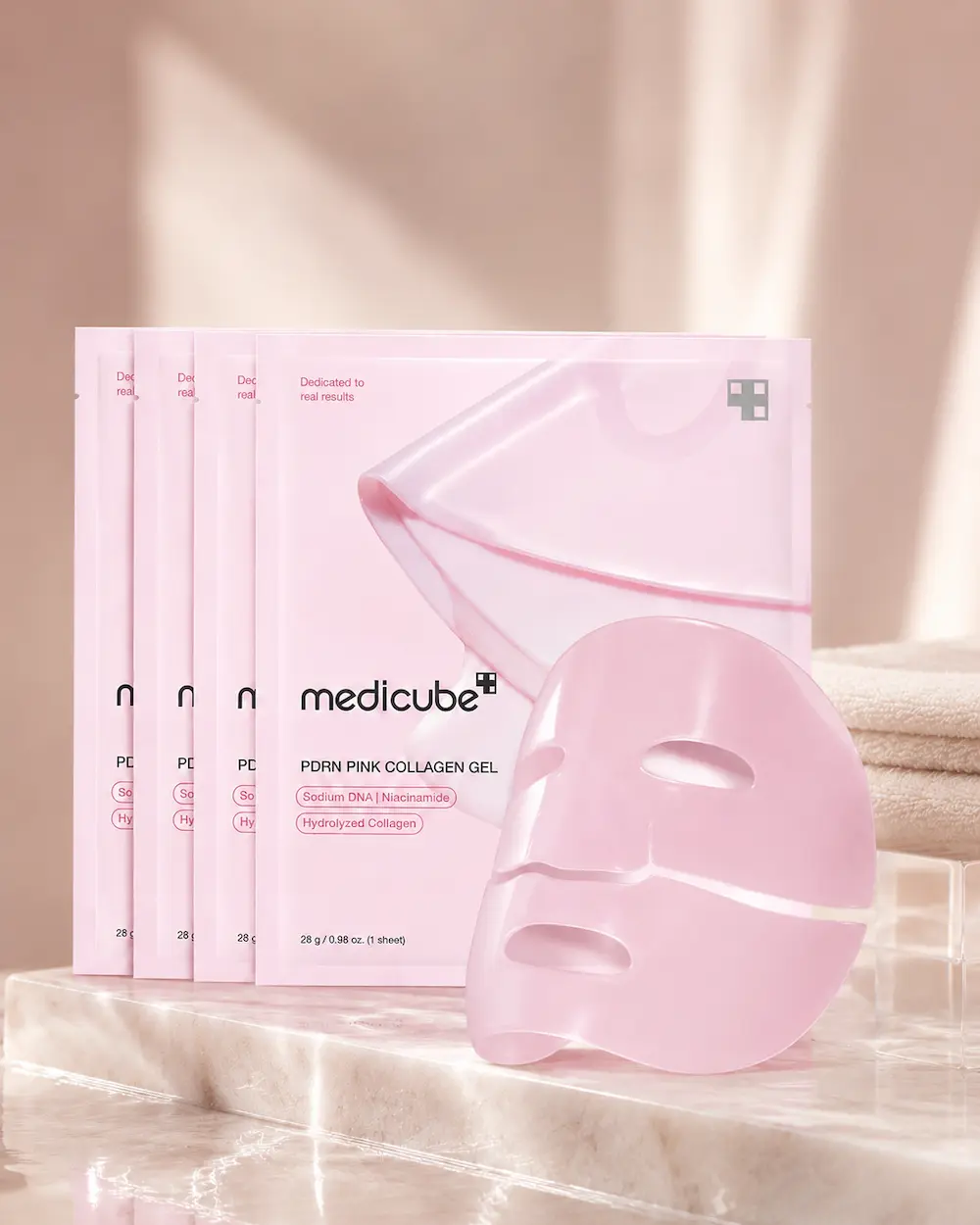 Maschera Medicube rosa in idrogel con collagene e PDRN