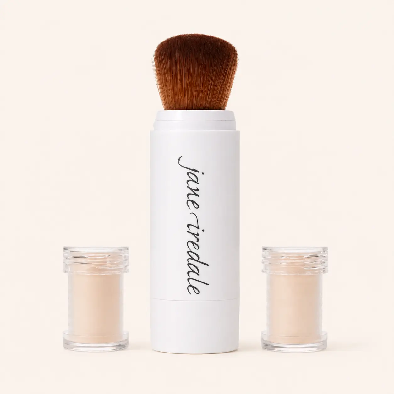 Jane Iredale Powder-Me SPF 30 con pennello e ricariche per ritoccare la protezione solare in polvere
