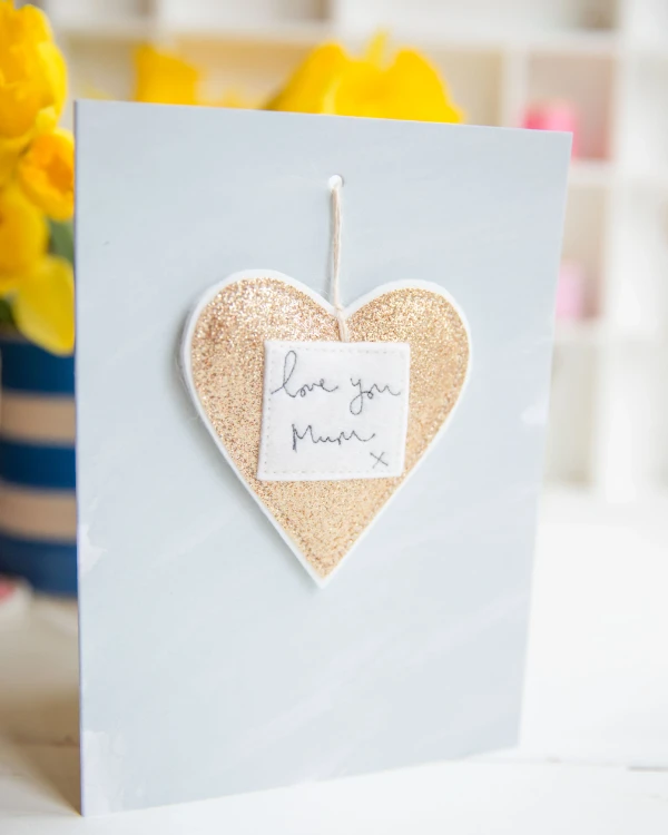 Gold heart token card