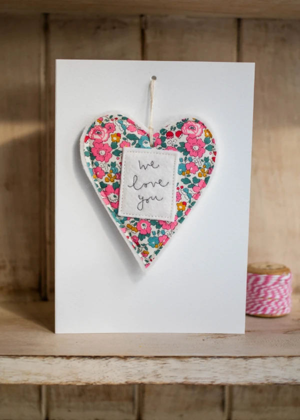 Greetings card with removable keepsake