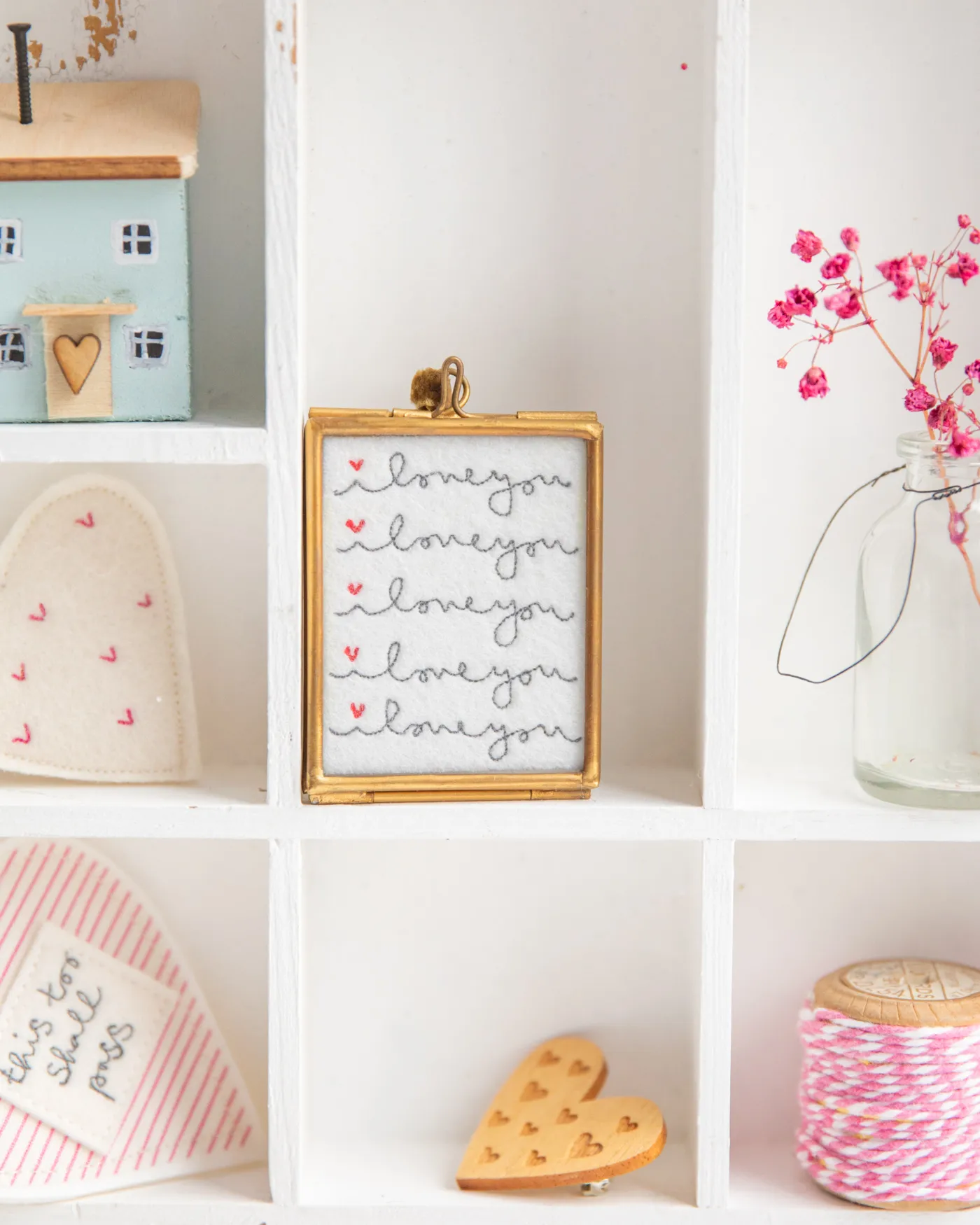 Tiny I love you i love you i love you embroidery with red hearts