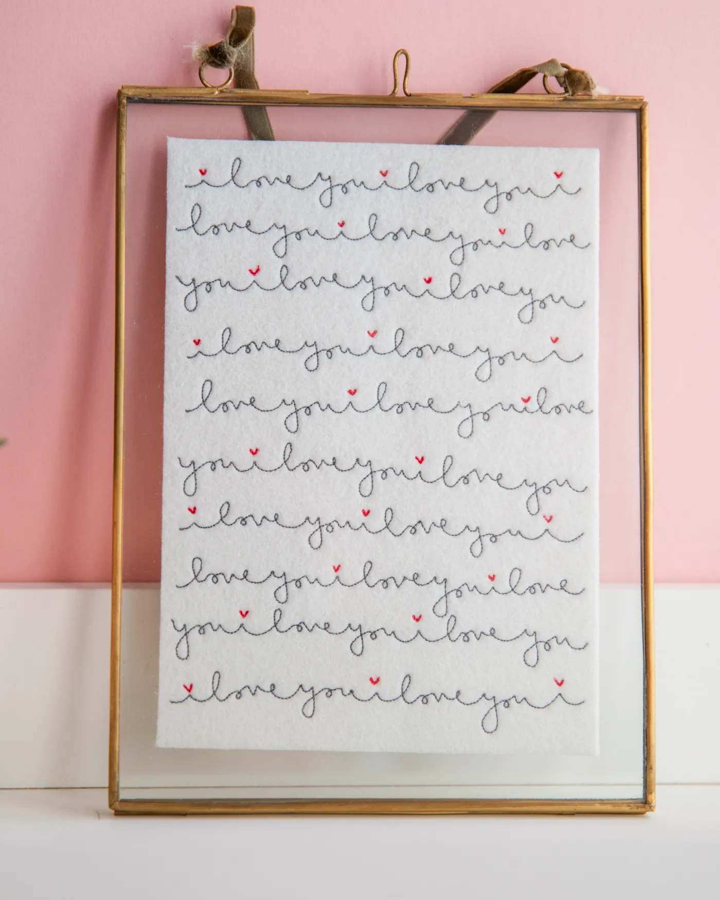 Medium I love you framed embroidery with red hearts. 