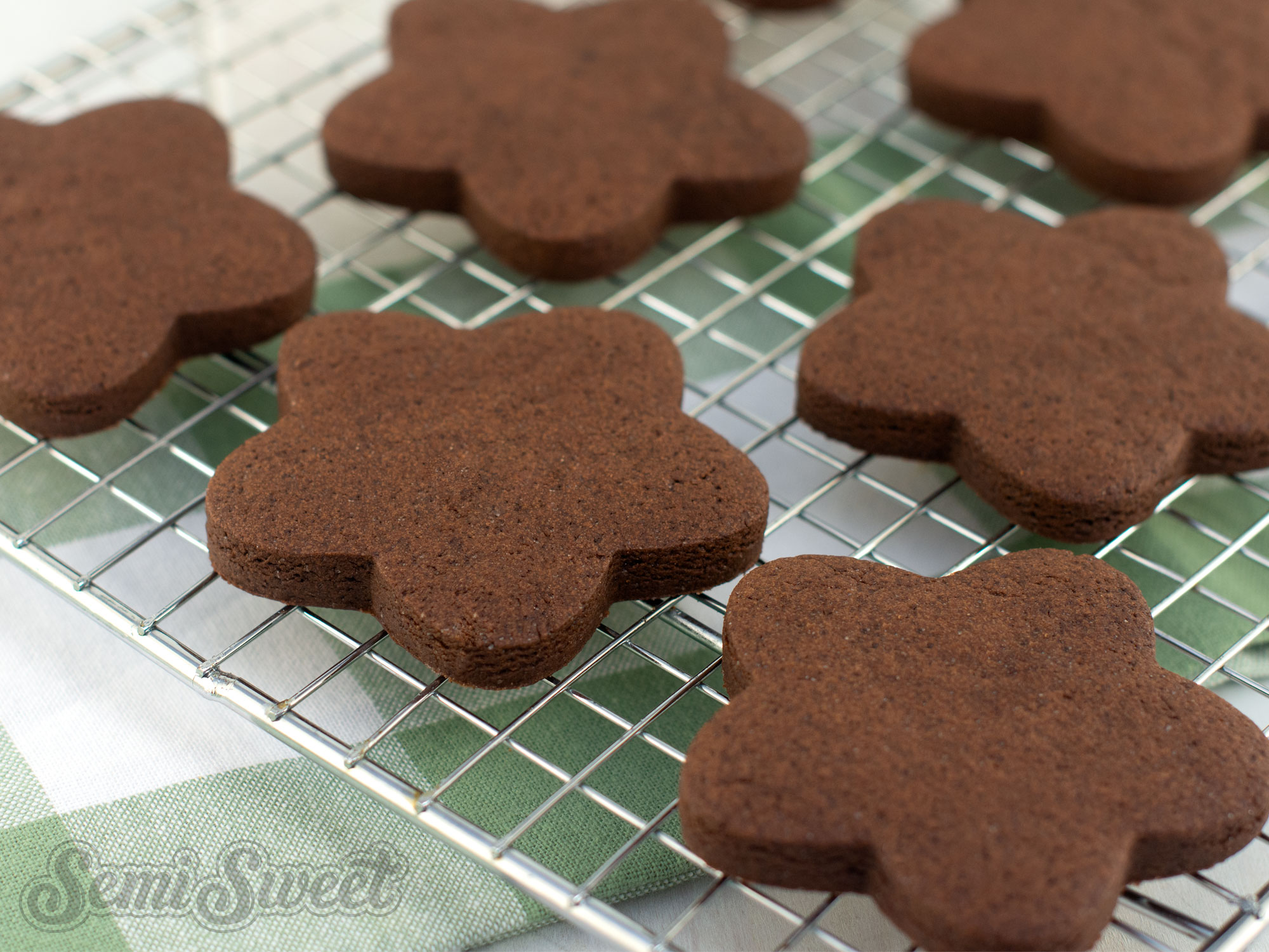 chocolate cut-out cookies on a cooling rack