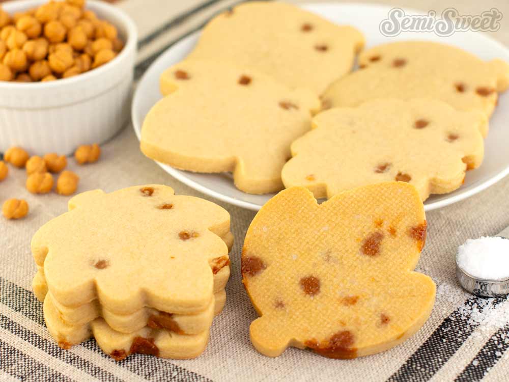 cover photo of salted caramel cutout cookies in the shape of fall leaves