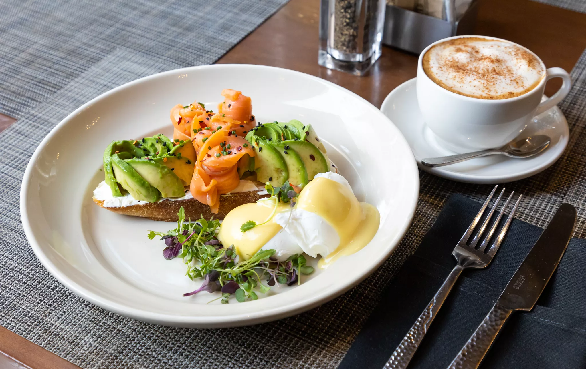 Food photography tip: styled brunch plate with smoked salmon, avocado, poached egg, hollandaise.