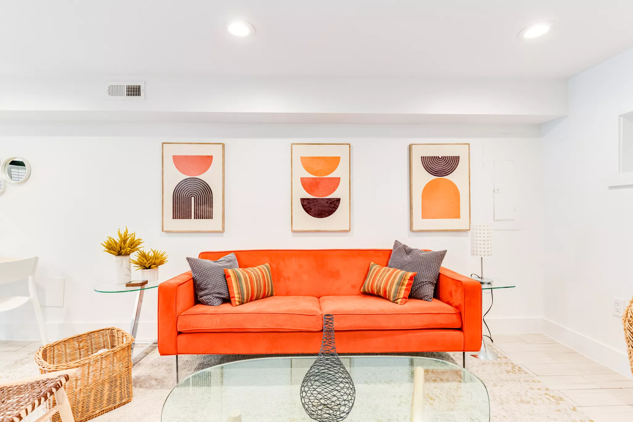 Bold mid-century living room staged for a real estate video tour.