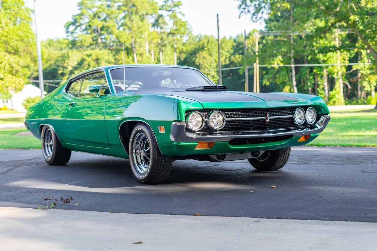 Green Ford Torino Cobra muscle car listed on AutoHunter