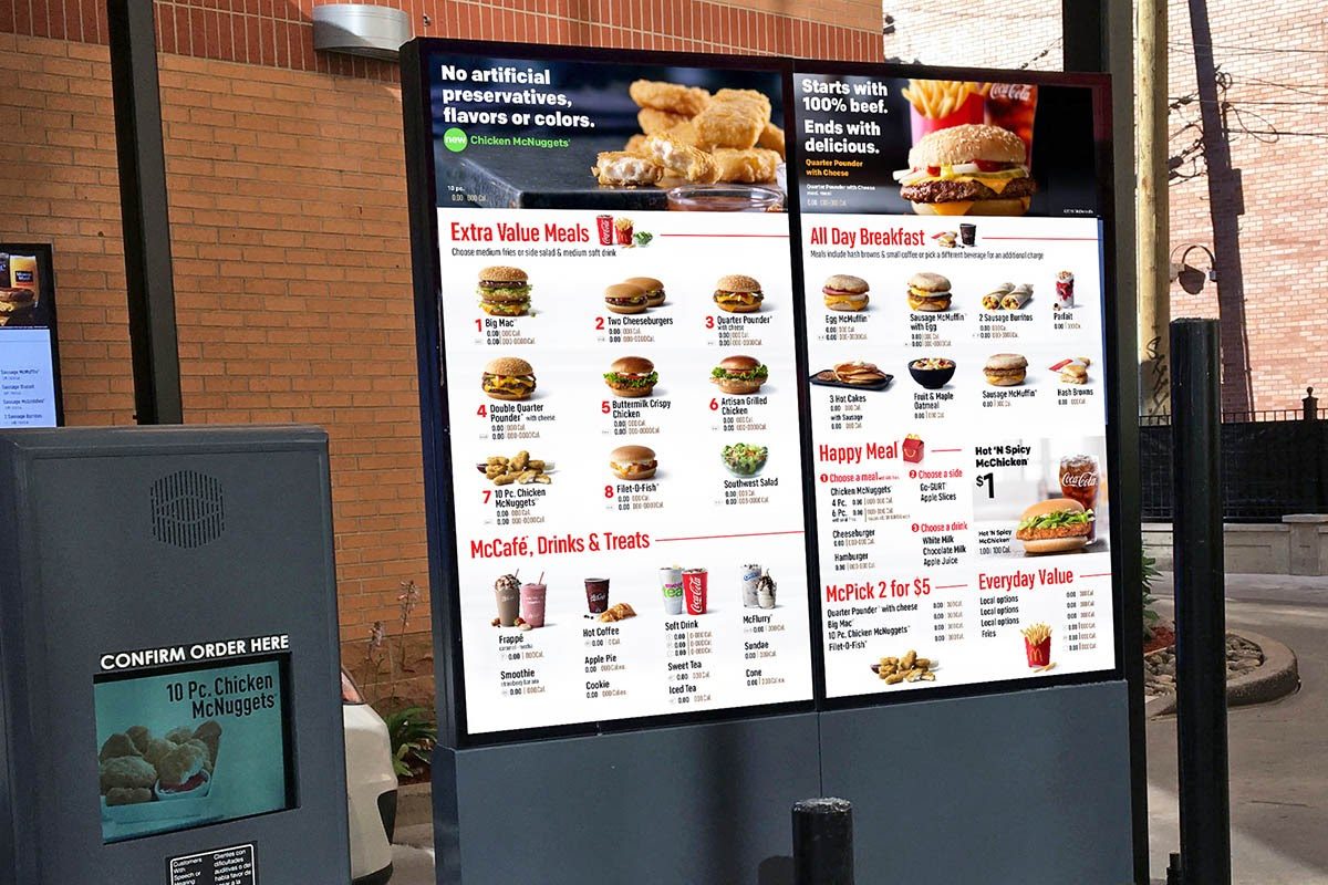 McDonald's drive-thru digital menu board displaying food items with professional photography