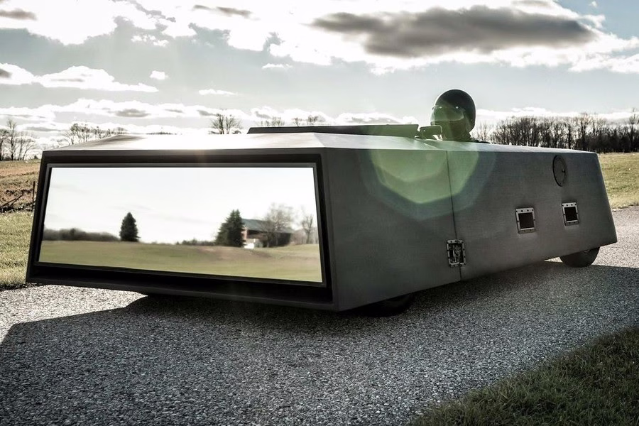 Minimalist boxy Consumer Car by Joey Ruiter driving on a road