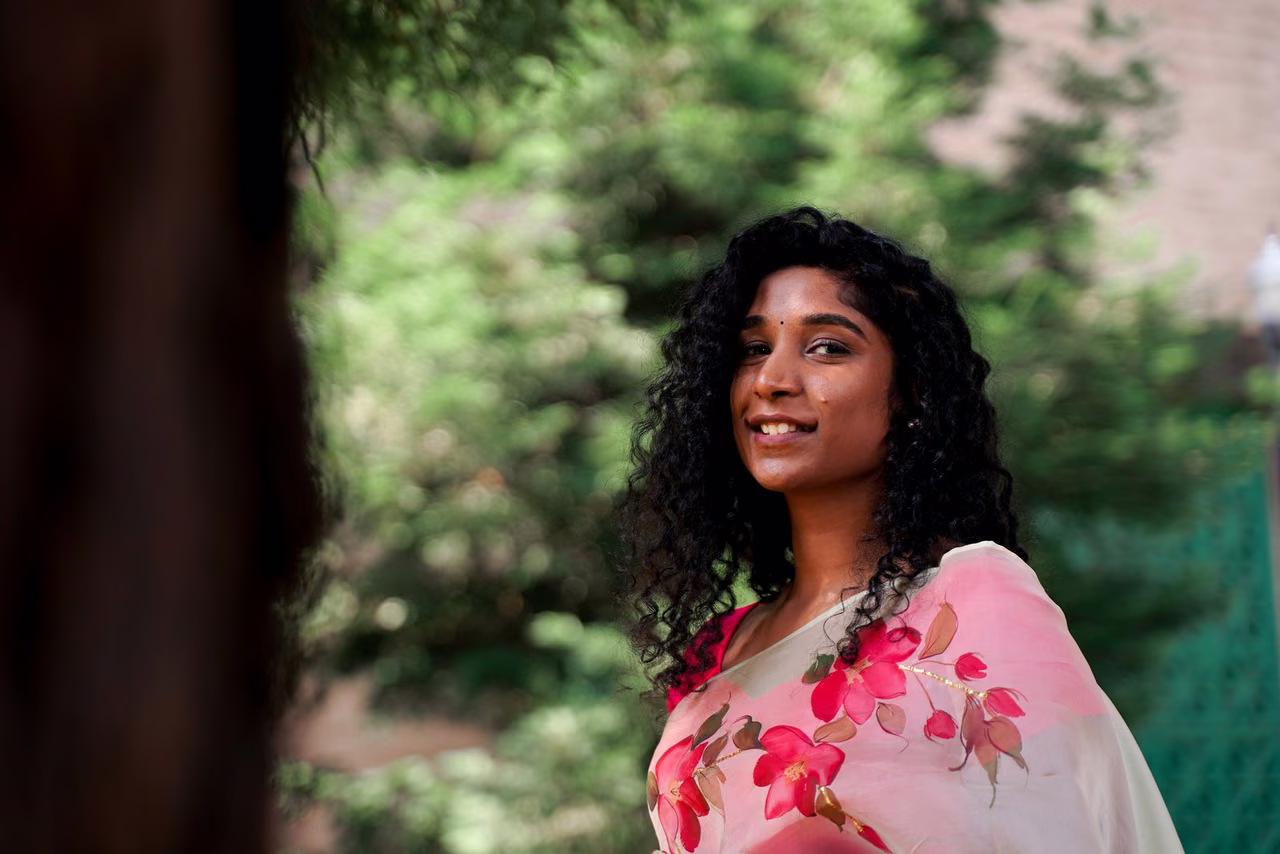 Outdoor portrait shot in flat daylight, the kind of image AI photo editing regrades into warmer golden hour light