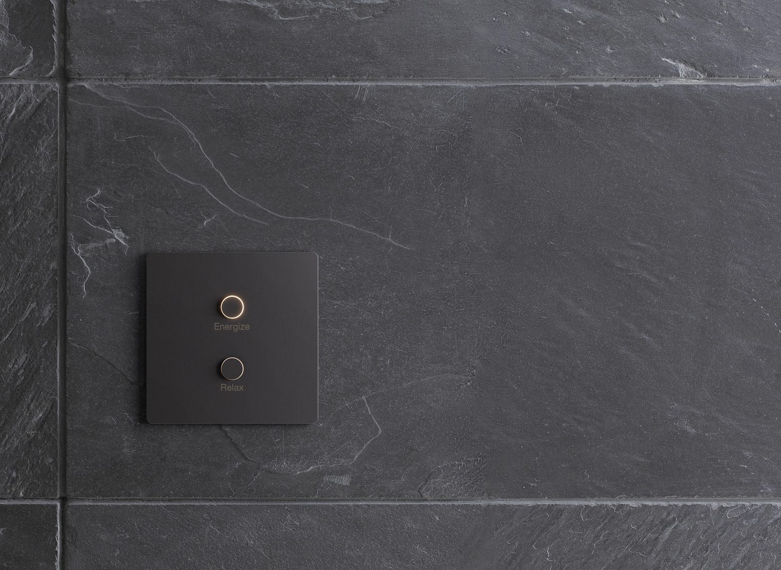 Lutron Alisse keypad in graphite mounted on a tiled wall