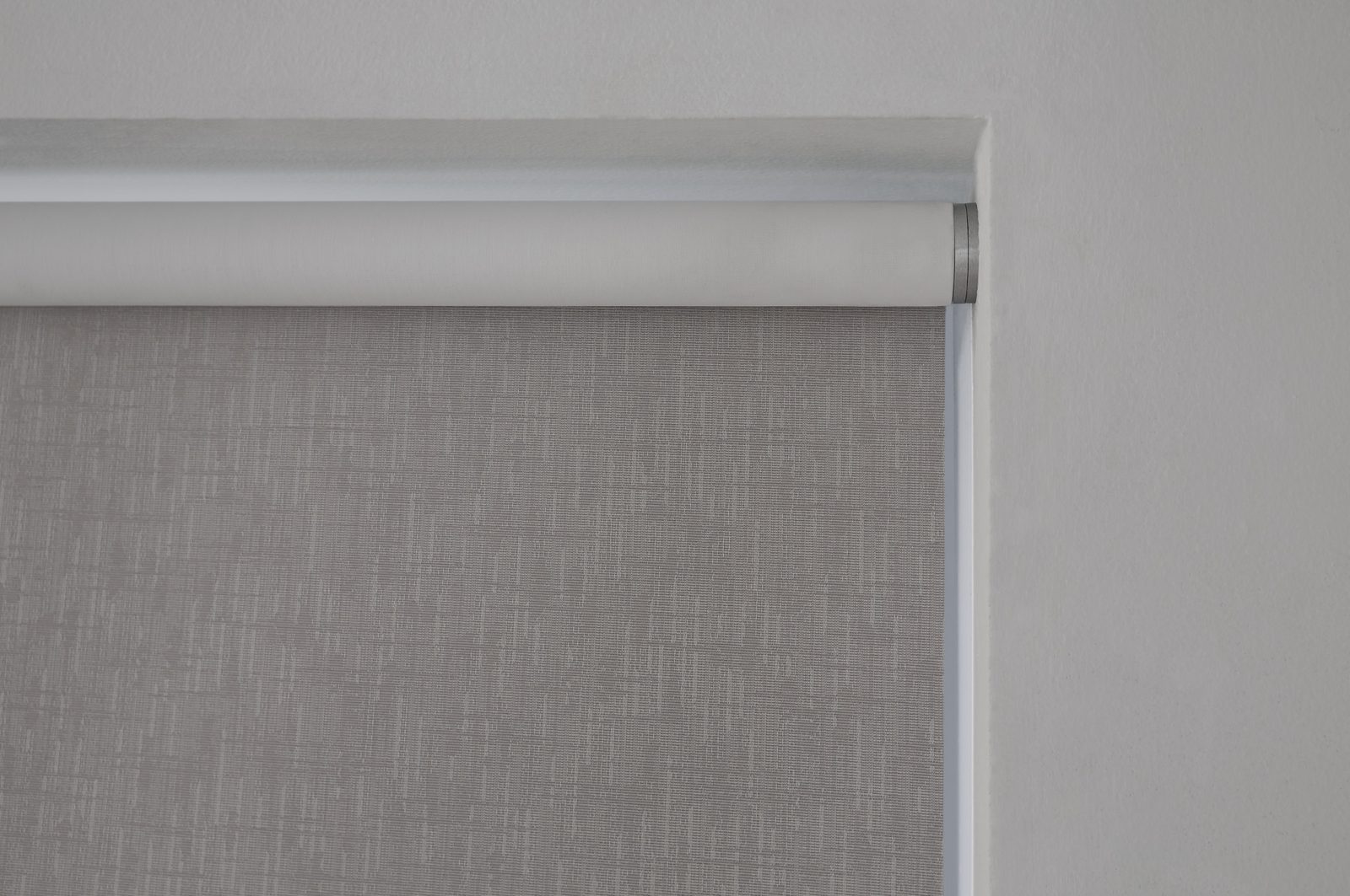 Lutron Palladiom roller shade with exposed satin nickel bracket