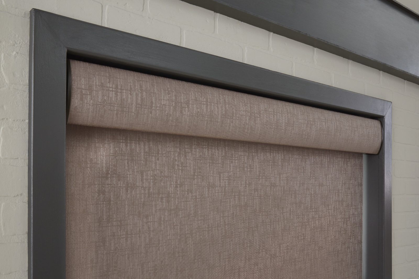 Lutron shade fascia detail in Matrice chinchilla blackout fabric