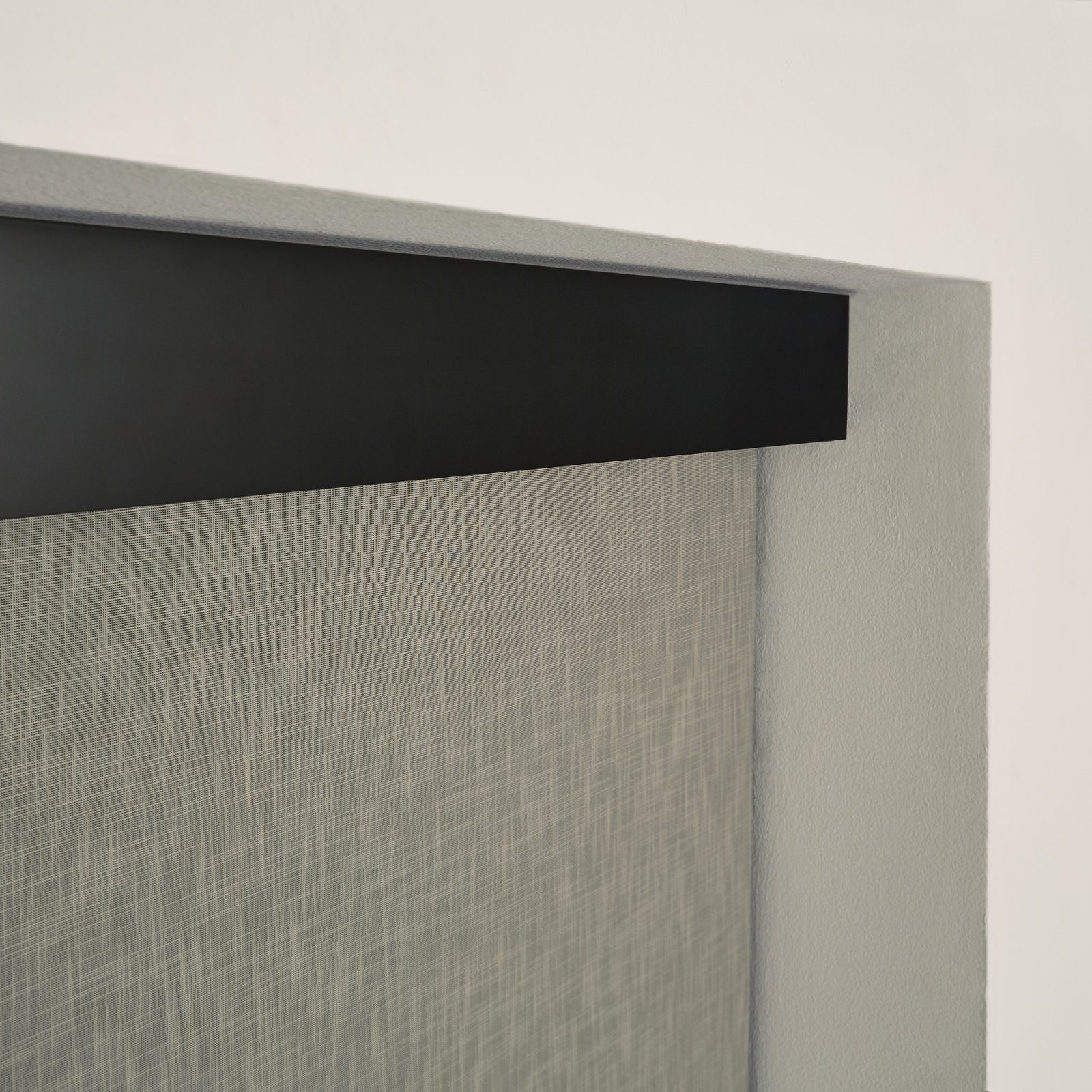 Lutron shade fascia detail in Hachure pewter blackout fabric