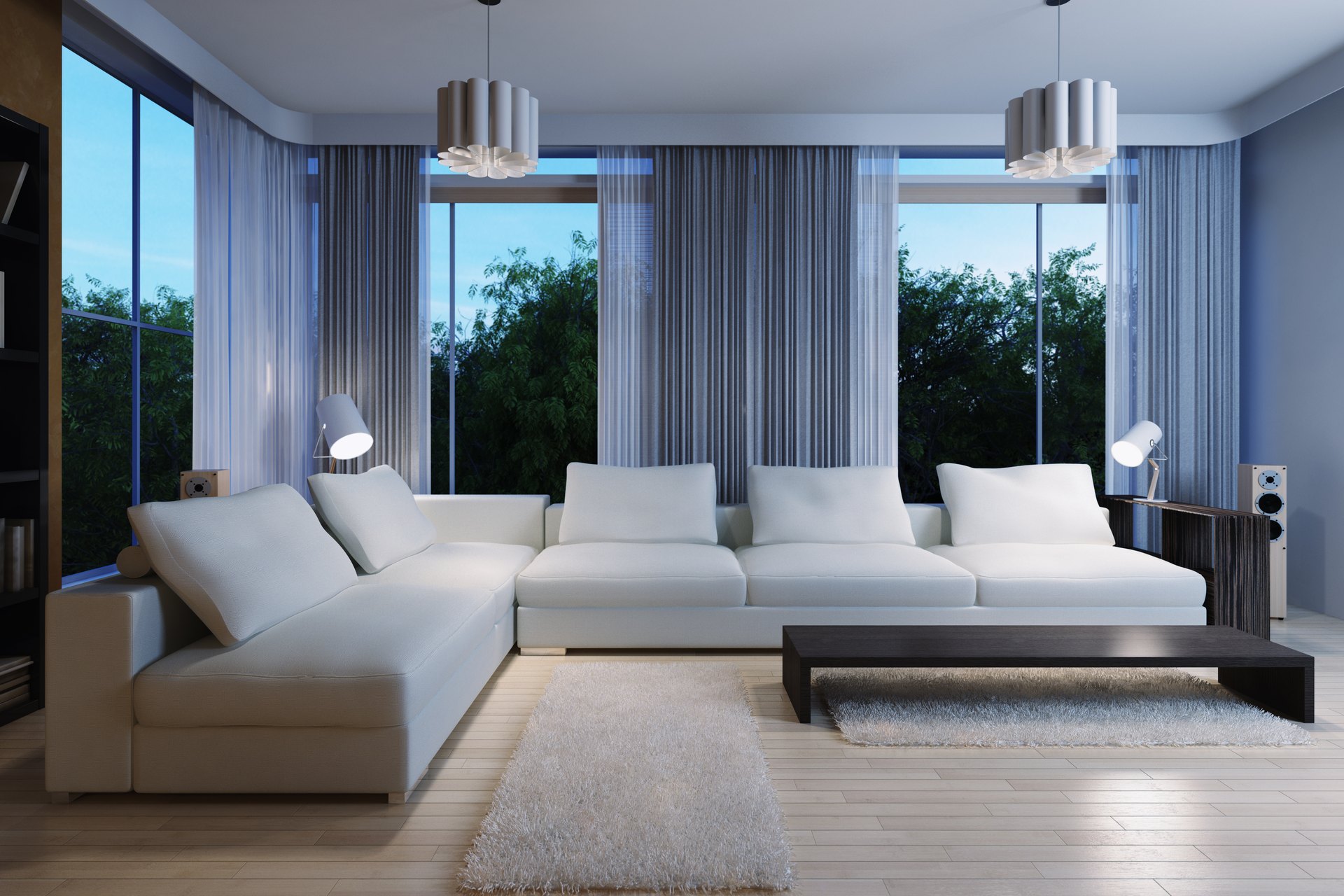 Living room with layered sheer drapery and shades