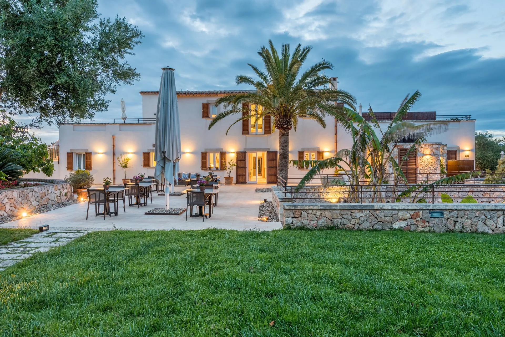 Estate exterior at dusk