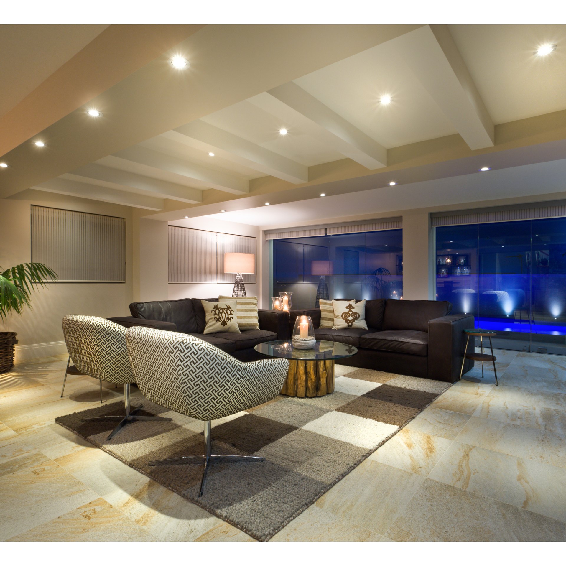 Luxury interior with architecturally integrated lighting, audio and concealed technology