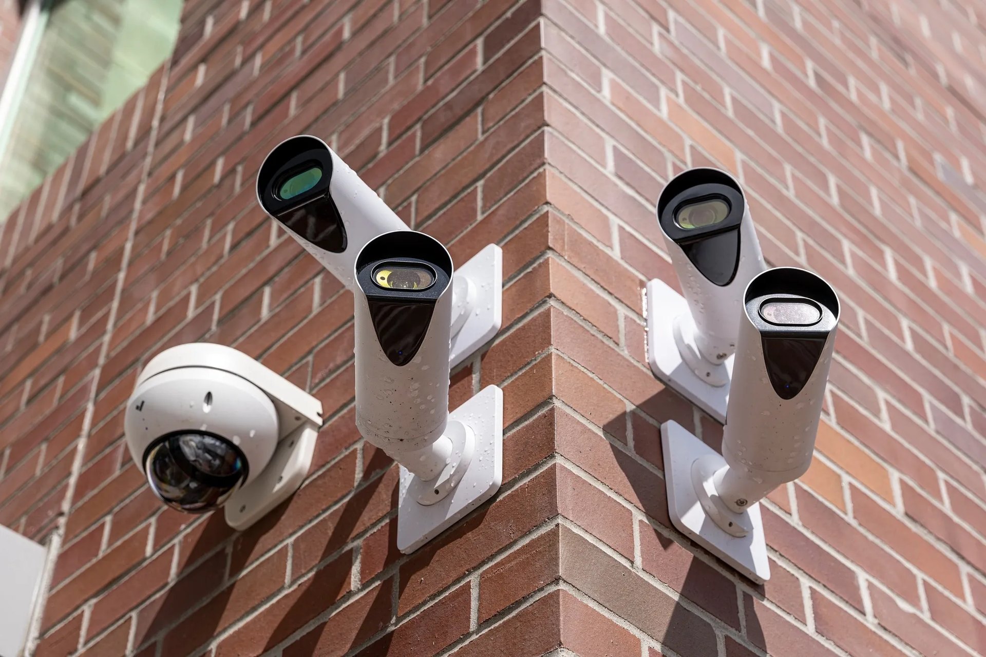 Camera mounted on a brick wall