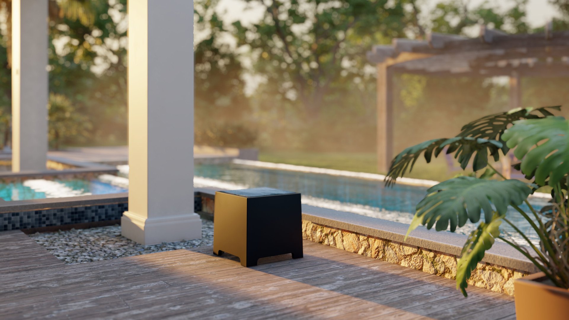 Outdoor subwoofer installed beside a pool deck