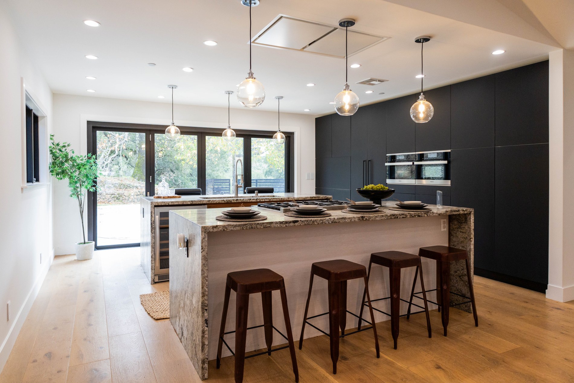 Luxury kitchen illustrating coordinated architectural lighting and smart-home control