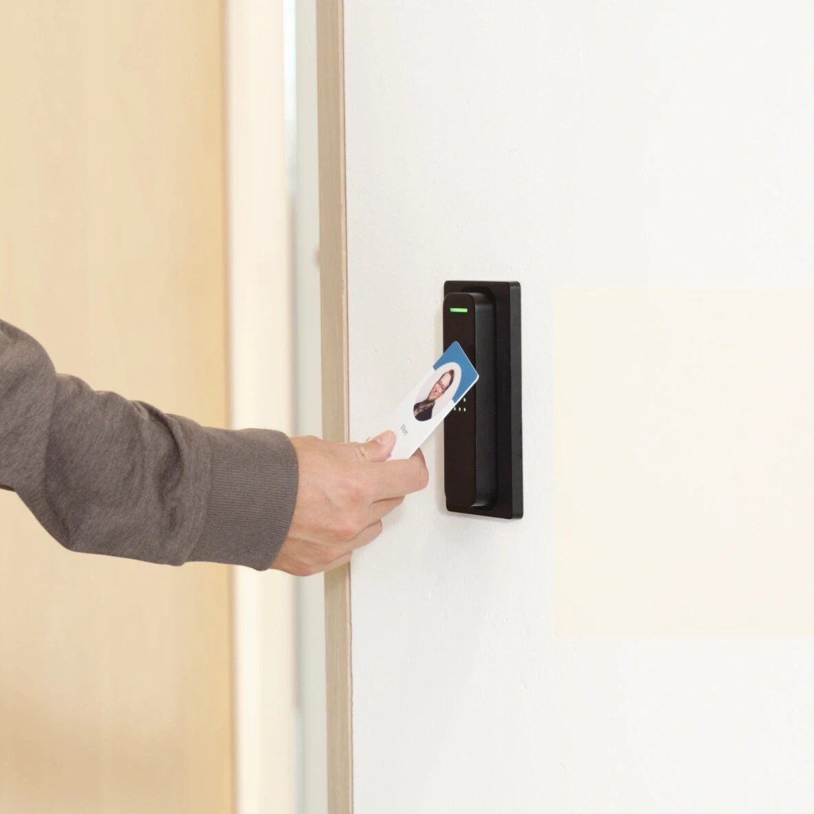 Access reader beside an office door