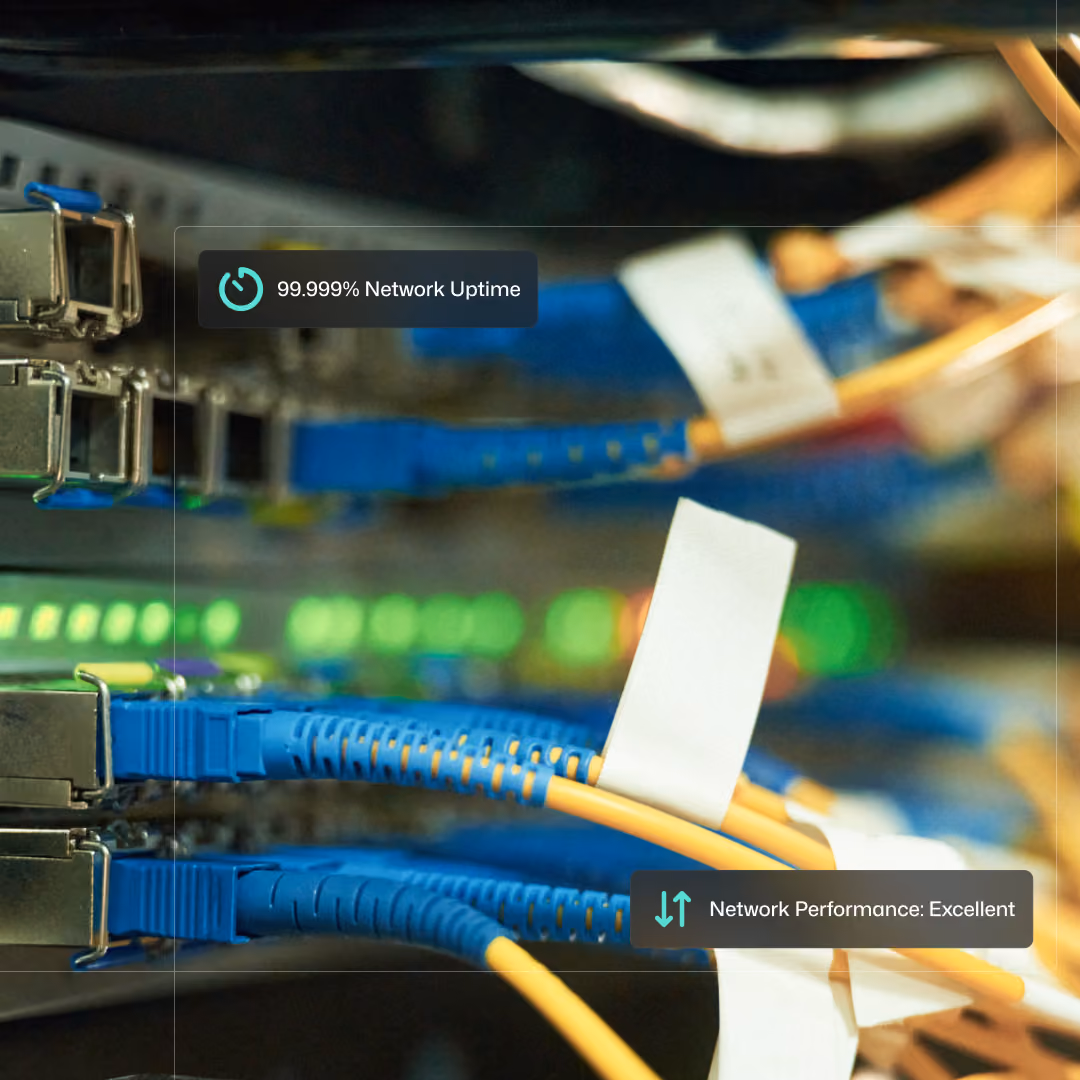 A network server rack with multiple cables plugged in, blinking lights indicate the server is online.