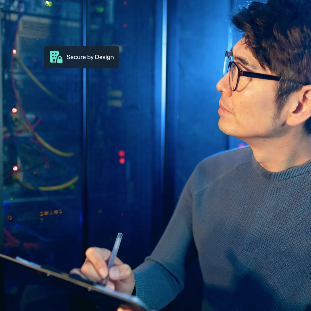 A cyber security expert checking a server rack has everything installed correctly.