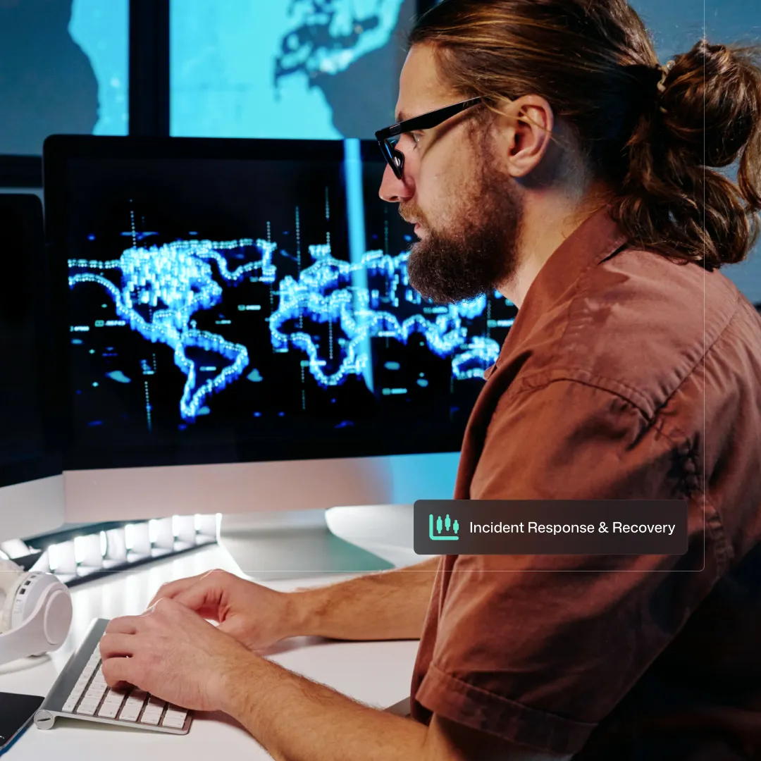 A cyber security team member checking on the status of a client's network, ensuring everything is secure