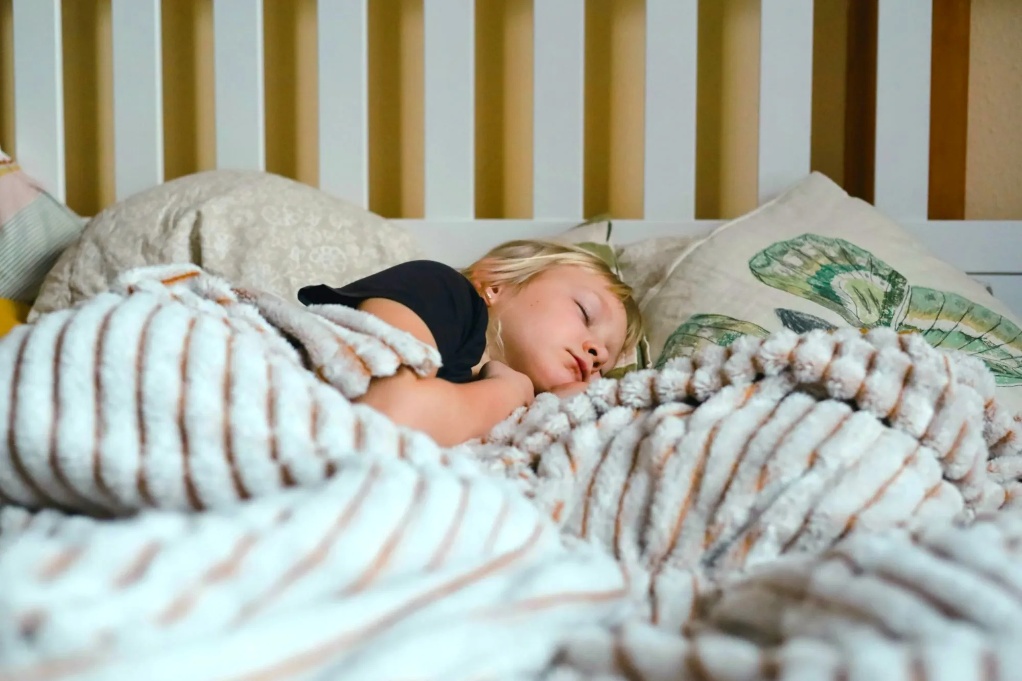 A child sleeping in bed